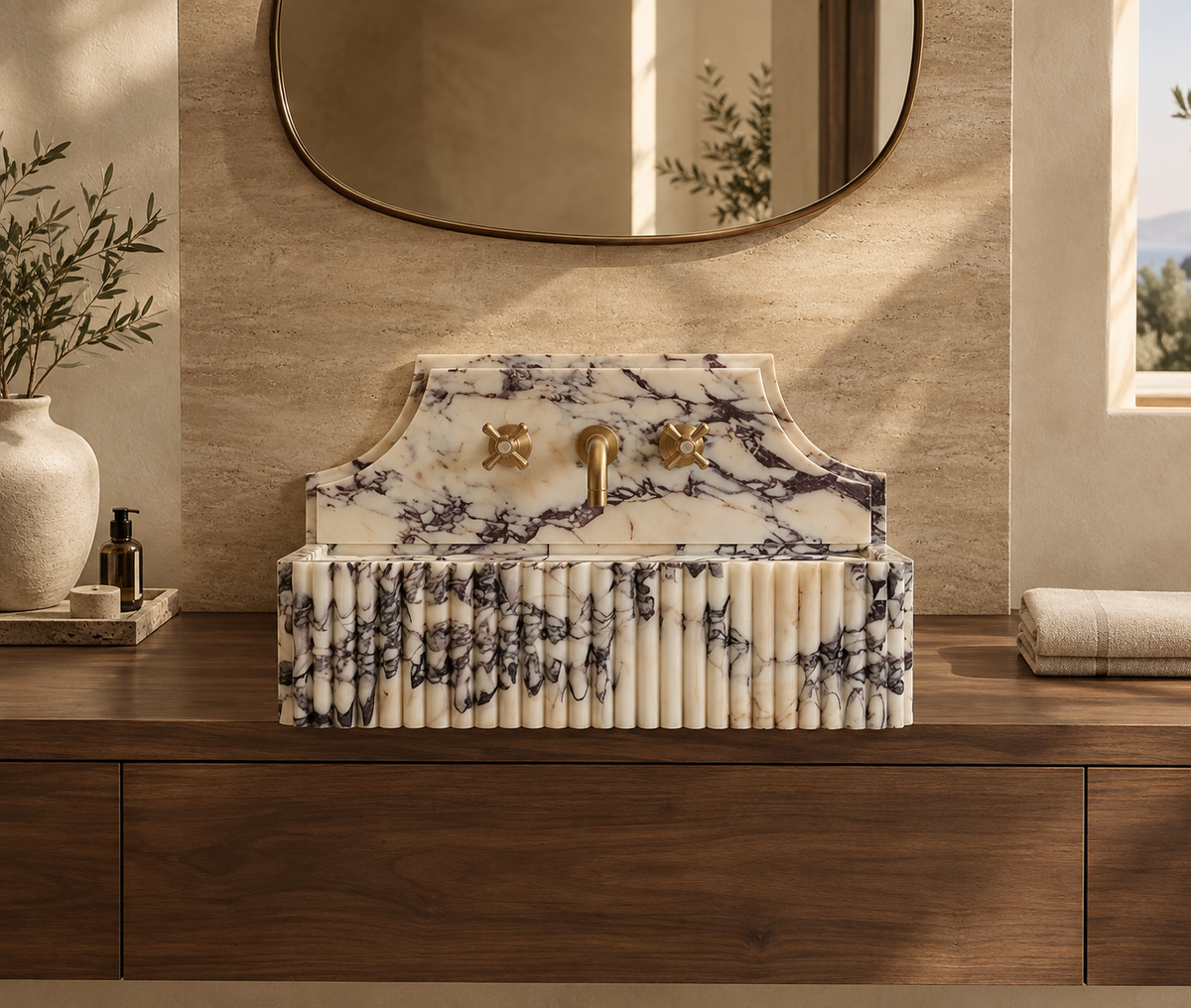 Kaunos Calacatta Viola fluted sink on a wooden vanity with mirror