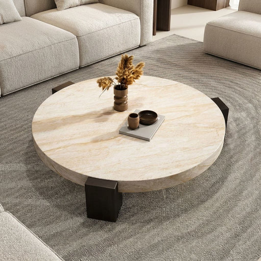 Lycia travertine coffee table styled with dried flowers and books