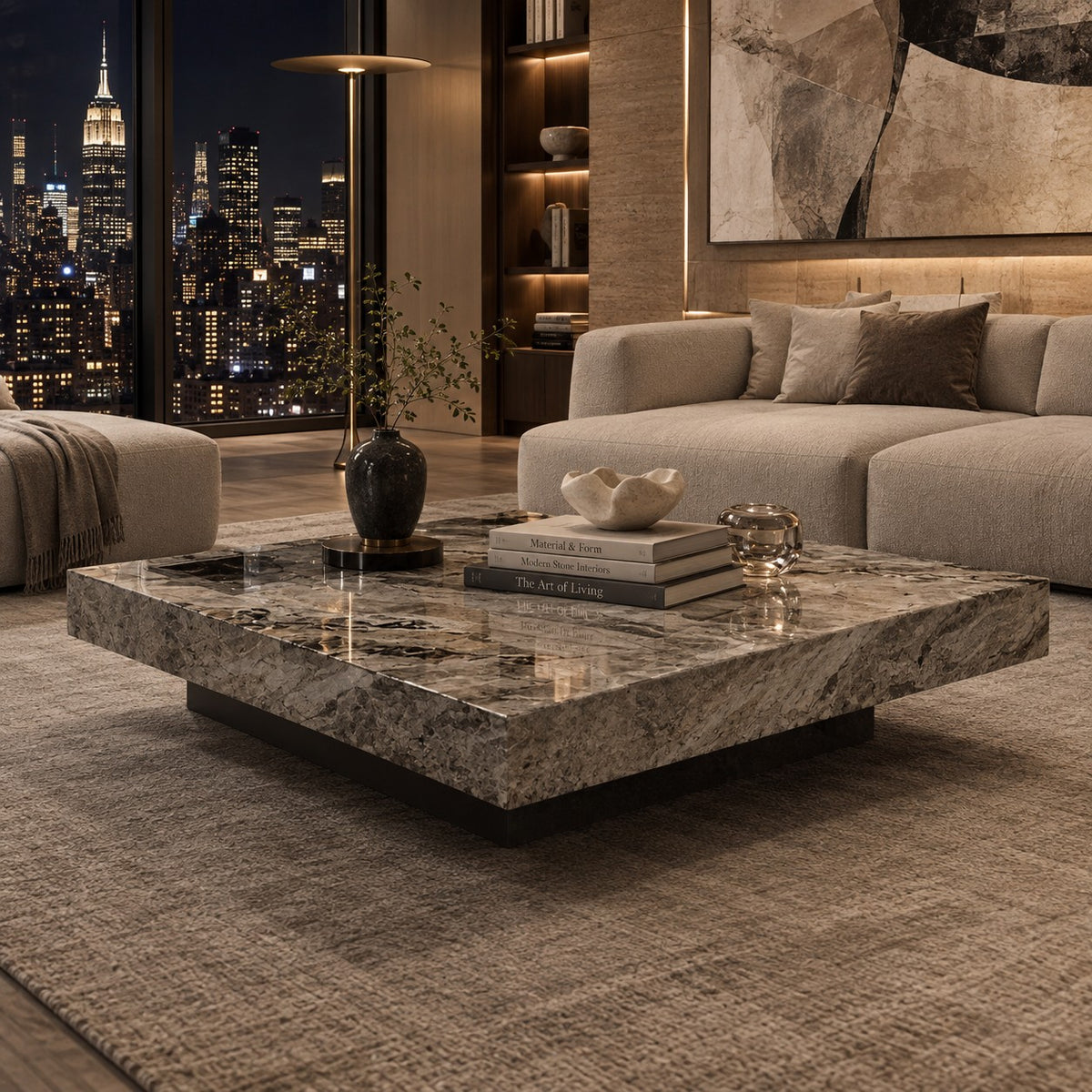 Velmora Stone marble coffee table in a New York penthouse living room at night